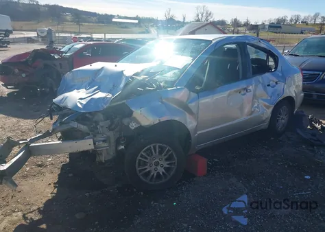 2012 Suzuki Sx4 Le/Le Popular z USA, uszkodzony, nr VIN JS2YC5A37C6302330